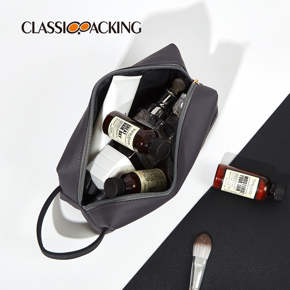 Bolso cosmético moderno y simple para hombres y mujeres bolso de lavado portátil impermeable material de PU bolso de almacenamiento de belleza de viaje de negocios