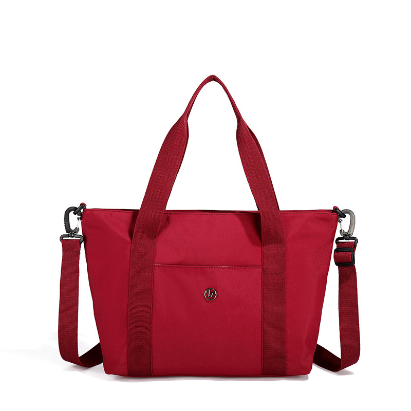 Primavera nueva bolsa de viaje impermeable de gran capacidad de alto valor, bolsa diagonal de un solo hombro para mamá de compras portátil de moda