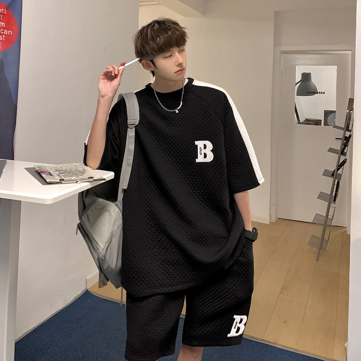 Waffle traje de verano para hombres New Youth estudiante de manga corta pantalones cortos de alta calle versátil marca de moda casual traje de dos piezas