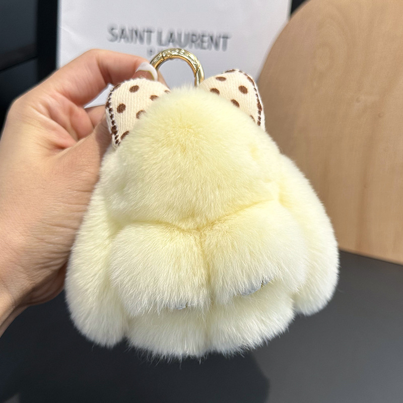 卸売りのかわいいウサギの毛の蝶結びの小さいウサギの自動車のキーホルダーはぬいぐるみのかばんを掛けて飾ります。