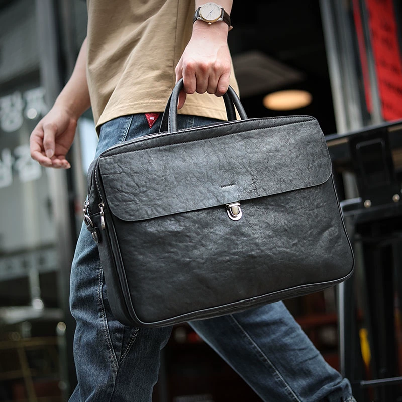 Elite black handheld capacious laptop for documents, genuine leather, business version