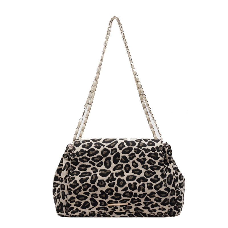 Bolsa de gran capacidad de tela de leopardo rojo, bolso de mujer 2024, nueva moda, textura de hombro, braza, mochila de estilo extranjero, mujer