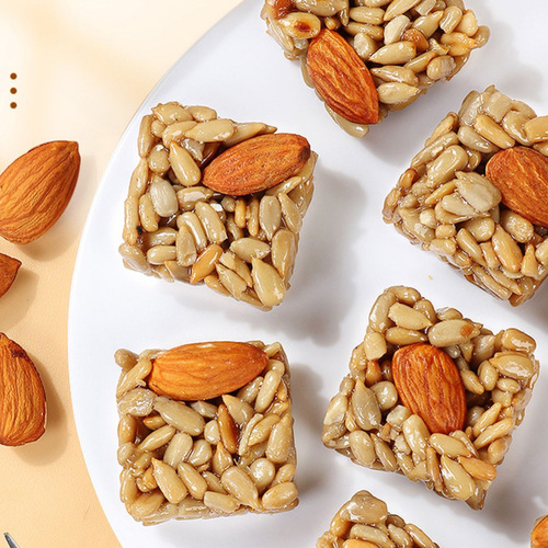 Wholesale leisure vogue zero food snacks independent packaging crisp bulk sunflower seed kernels almonds melon seed kernels brittle