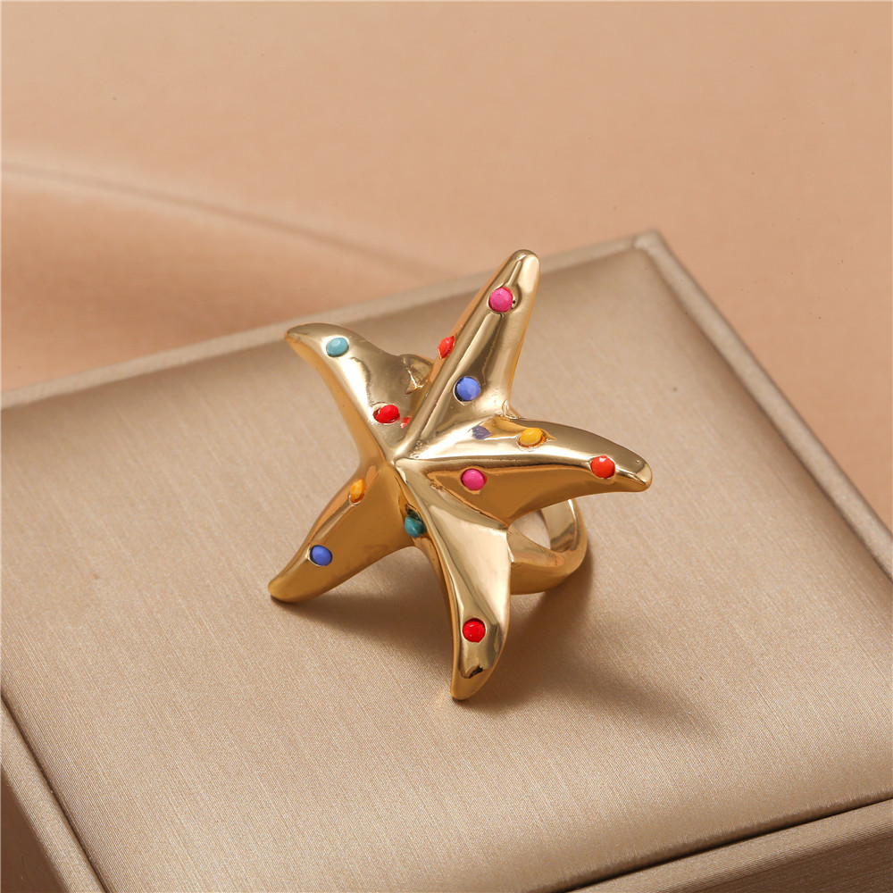 Korean New Starfish Five-pointed Star Dripping Oil Alloy Ring display picture 1