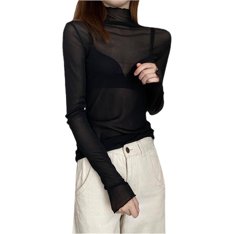 身を修める高襟の中に長袖レースの底のシャツを掛けます。