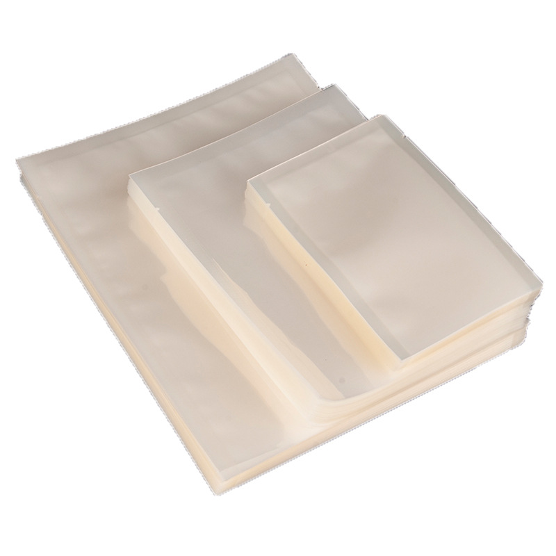Bolsa sellada brillante Bolsa de embalaje de plástico para alimentos Bolsa de embalaje al vacío gruesa al por mayor Bolsa de plástico al vacío transparente fácil de rasgar