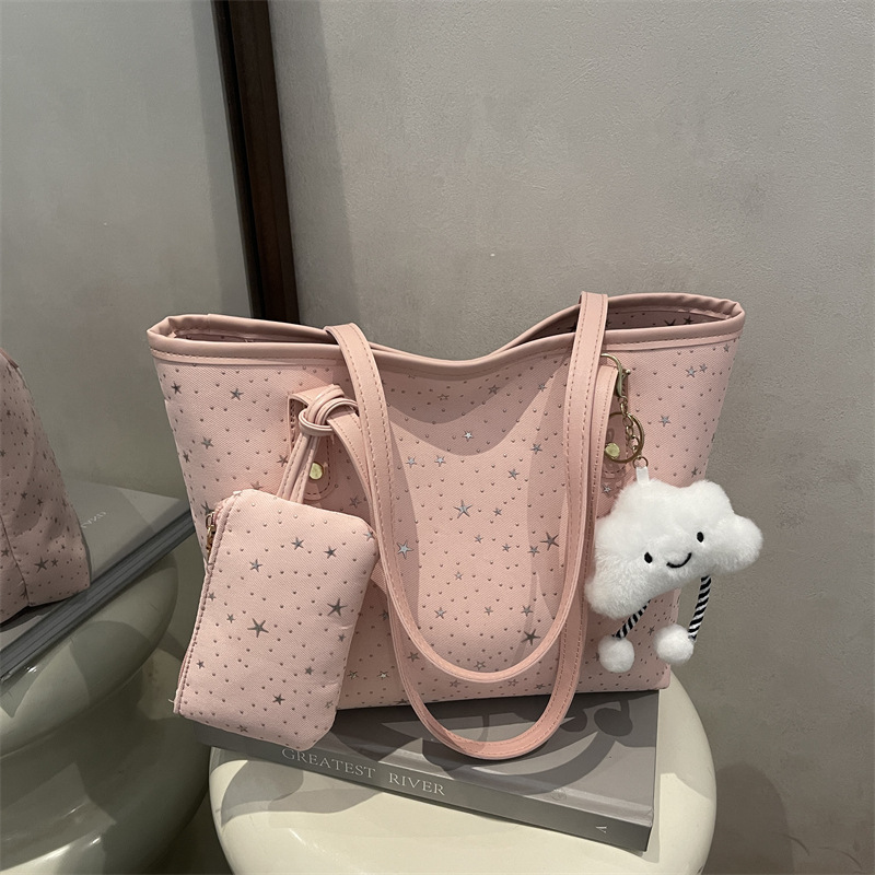 2026 primavera nueva bolsa de hombro de gran capacidad bolsa de brazo universal tendencia transfronteriza dulce viento bolso de mano bolso de mujer