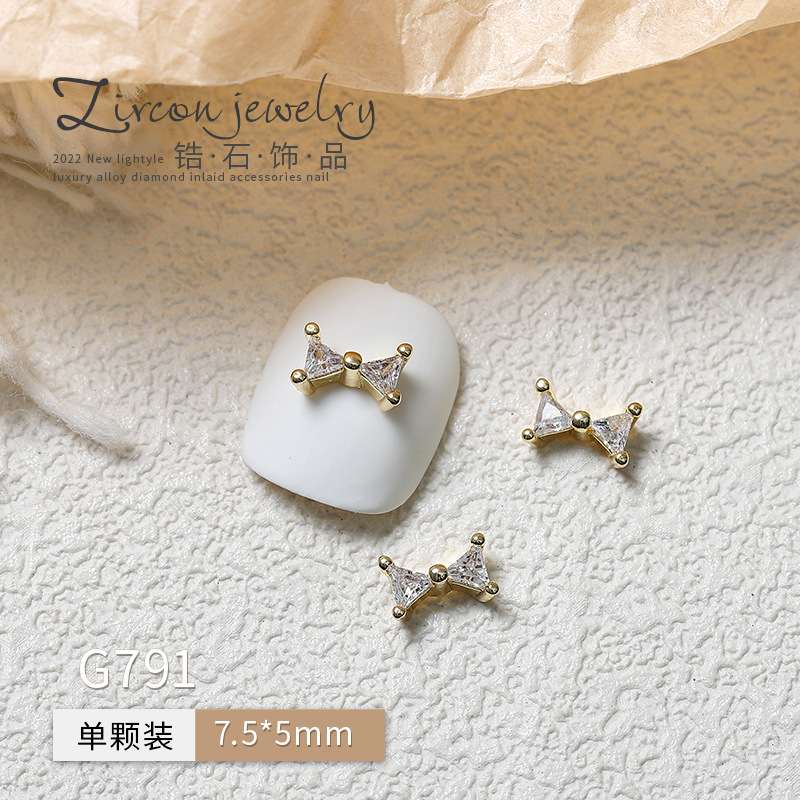 En LÍNEA DE MANICURA de la celebridad francés arco tridimensional uñas fototerapia avanzada cristal decorativo tamaño pequeño metal joyería diamante circón