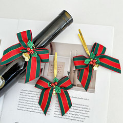 クリスマスの鈴の蝶結びの装飾の帯のクリスマスツリーのペンダントの部品の赤緑のストライプの蝶結びの鈴の帯