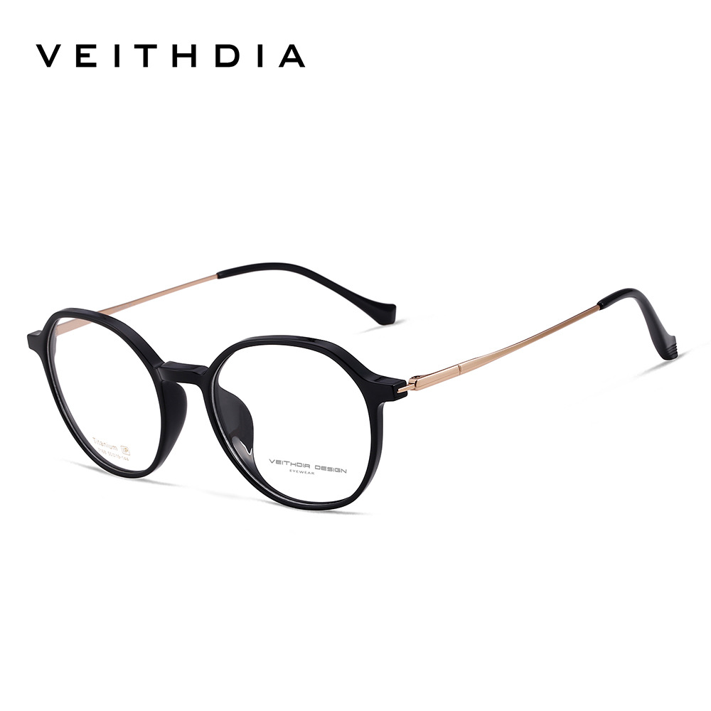 Pie de titanio puro marco de espejo de miopía óptica retro marco de ojo para hombres y mujeres puede estar equipado con grado spot al por mayor 7168