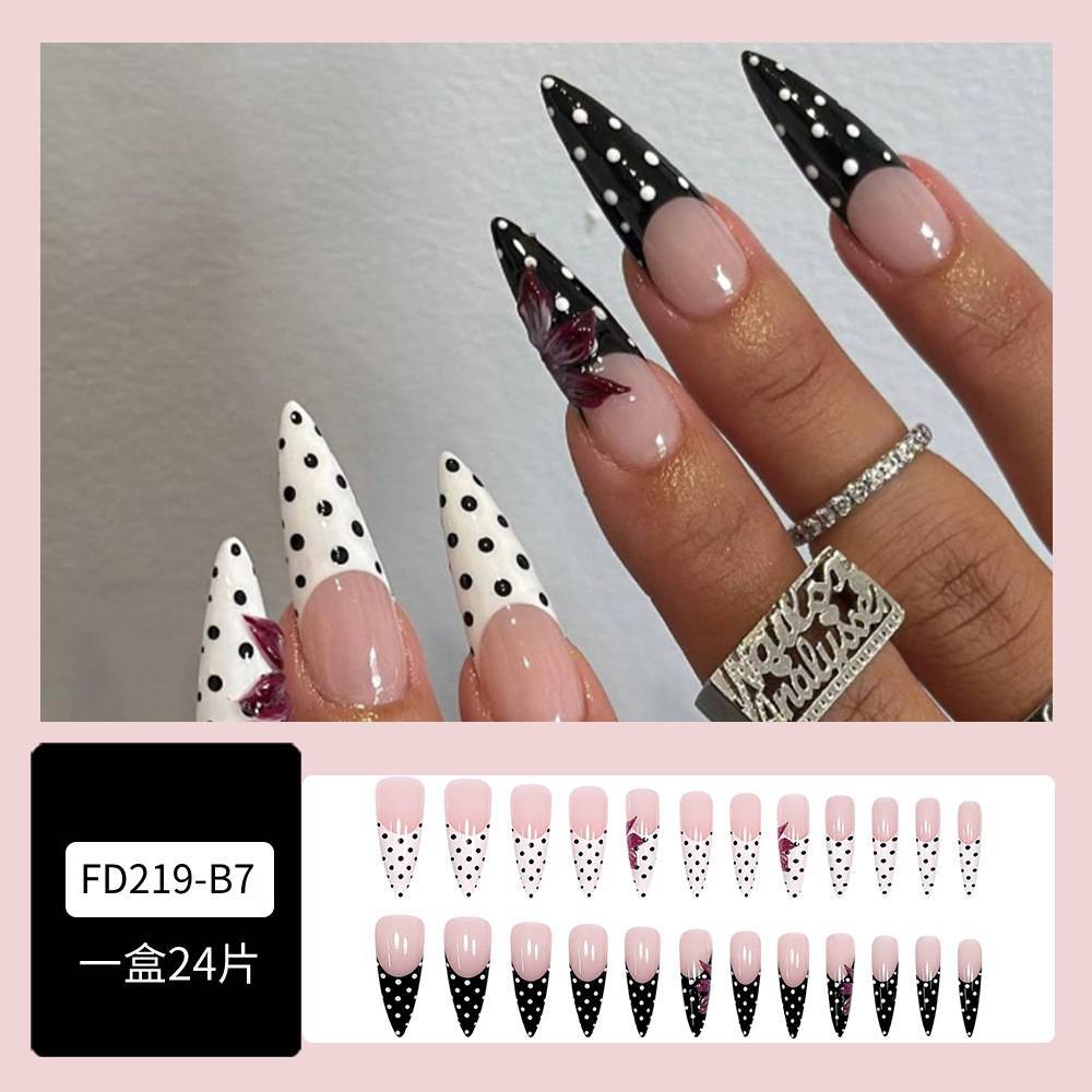 Polvo desnudo blanco y negro ondulado punto de manicure francés 3D flor roja tridimensional desgaste de uñas transfronterizas 24 piezas de parche de uñas