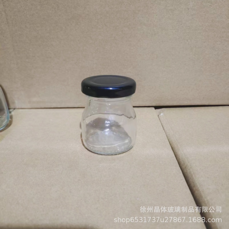 卸売り100mlガラス布丁瓶厚手牛乳カップ耐高温ヨーグルト瓶木栓ガラス瓶許瓶瓶