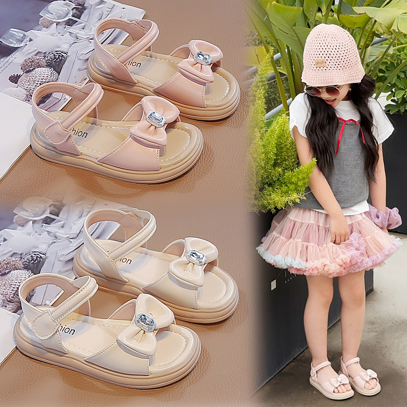 Sandallas de arco para niñas 2026 verano nuevo tipo de zapatos de playa suaves para niños zapatos de princesa universal