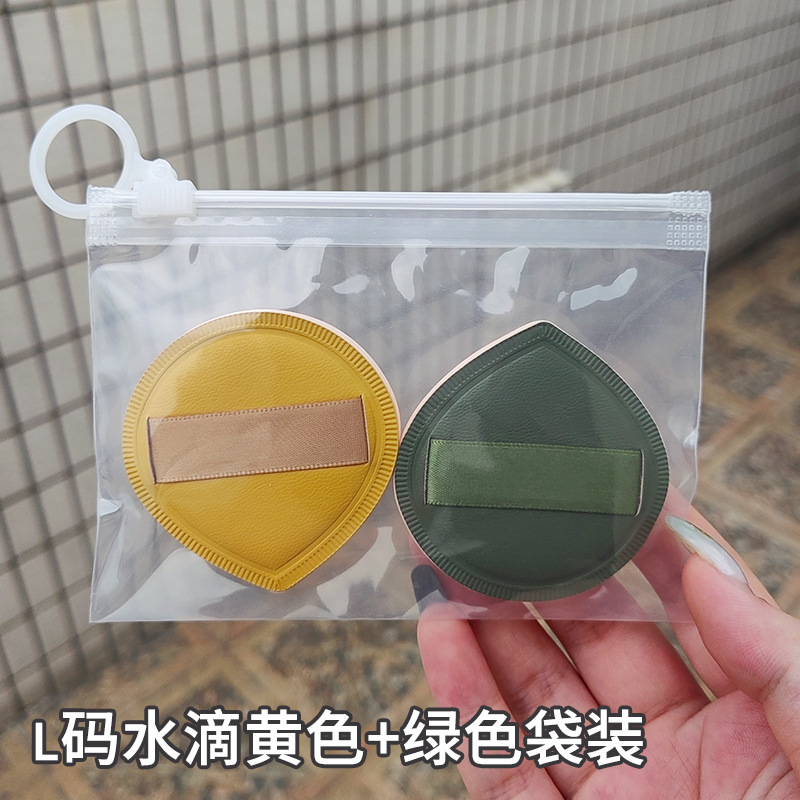 100分パフの木の大きいサイズのマシュマロのパフの空気感の乾湿の両用の粉の底液はエアクッションのパフを使います。|undefined
