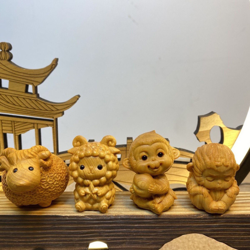 金檀木の漫画の十二生肖の手の件の木彫りのペンダントの文は工芸品の観光地区の露店を遊んでよく売れています。|undefined