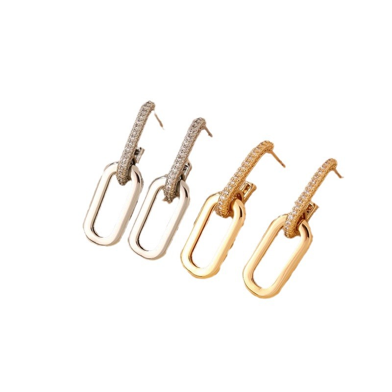 Orecchini pendenti a catena con zirconi incastonati per donna_voghion.com