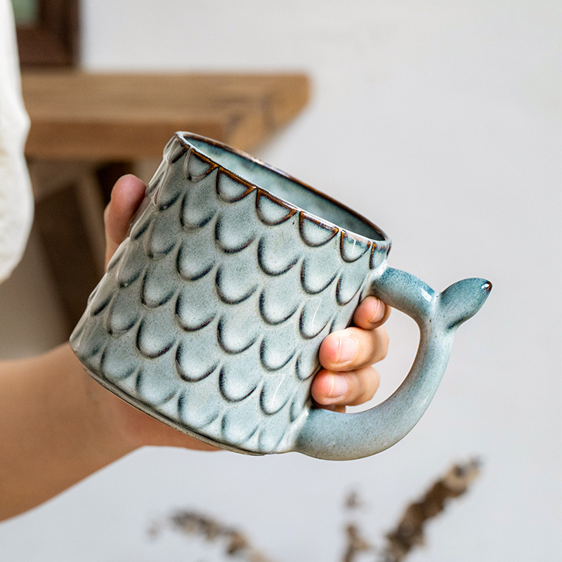 Nuevo diseño en relieve sirena Taza de cerámica personalizada taza vintage horno esmalte taza de café exportación transfronteriza