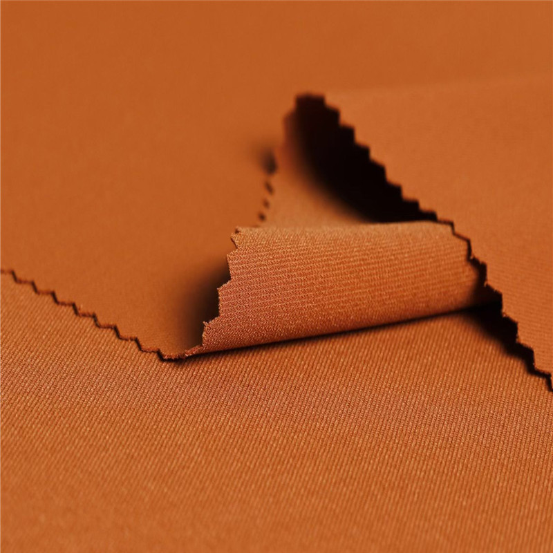 现货女装歌丽斜面料 全涤微弹垂感面料 春秋小西装外套裤装布料