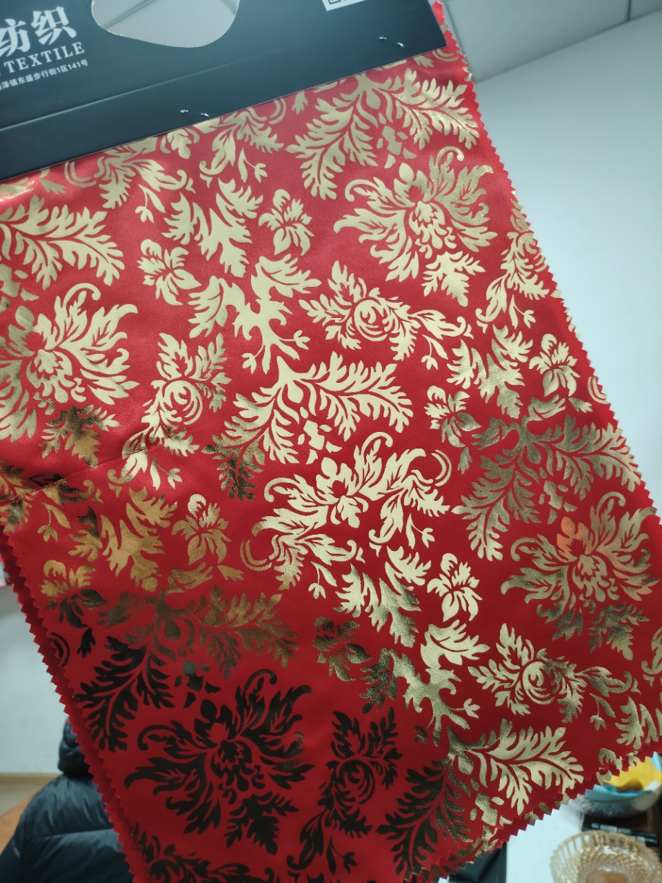 厂家销售涤纶弹力烫金布工艺包边布 金色凤尾花装饰针织面料批发