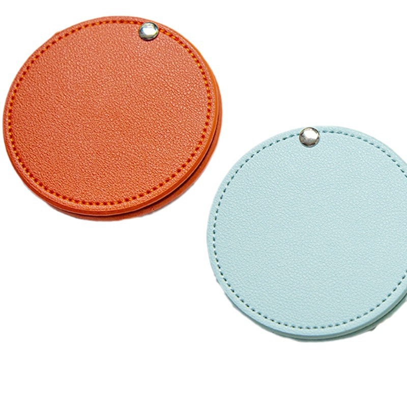 Regalo portátil pu maquillaje espejo moda publicidad regalo belleza espejo fábrica al por mayor giratoria cuero maquillaje espejo