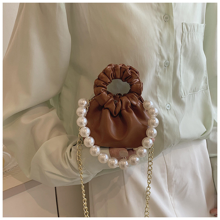 255g Weight Beading, Pearls Fashion Element Clasp Frame Closure Type Top Handle, Chain Strap Type Crossbody Bag Bags Type Casual, Daily, Shopping Occasion Pu Leather Material Solid Color Pattern All Seasons Season Kid'S Gender Cute Style Bucket Shape Kid'S Pu Leather Solid Color Cute Beading Pearls Bucket Clasp Frame Crossbody Bag 32