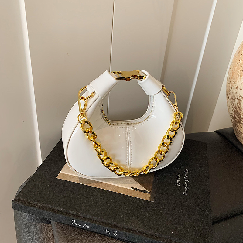 洋气拼接个性手拎饺子包女2025夏季新款时尚油蜡皮迷你单肩斜挎包