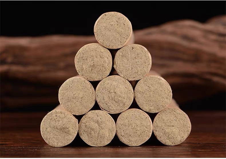 Wanli Moxa Sticks Ai Tiao 艾条 Aged Hand-Ground Mugwort Rolls for Traditional Moxibustion 10 Sticks per Box in use