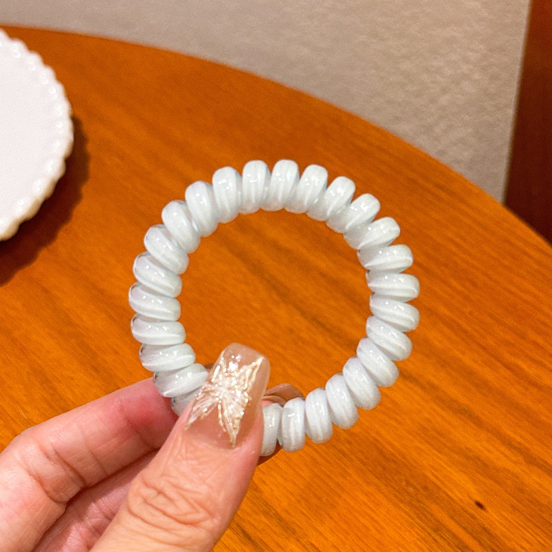 キャンディー色の電話線の髪輪の女性は高弾力で長持ちします。|undefined