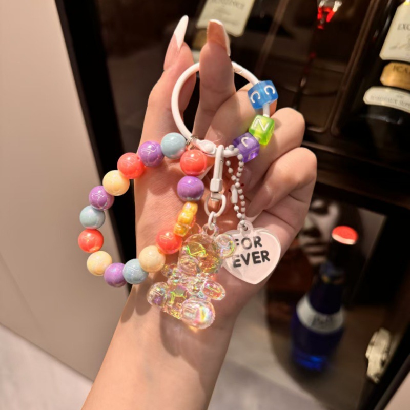 Nuevo llavero con cuentas de oso acrílico colgante de bolso creativo pequeño regalo con cuentas de color fresco al por mayor