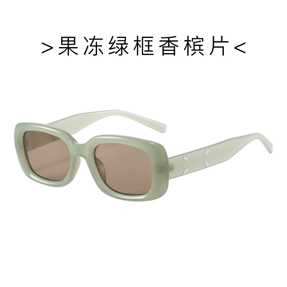 Xiaohongshu mismo estilo personalidad gafas de sol de montura pequeña gafas de sol de moda hip-hop nuevo color caramelo street shooting versión coreana al por mayor