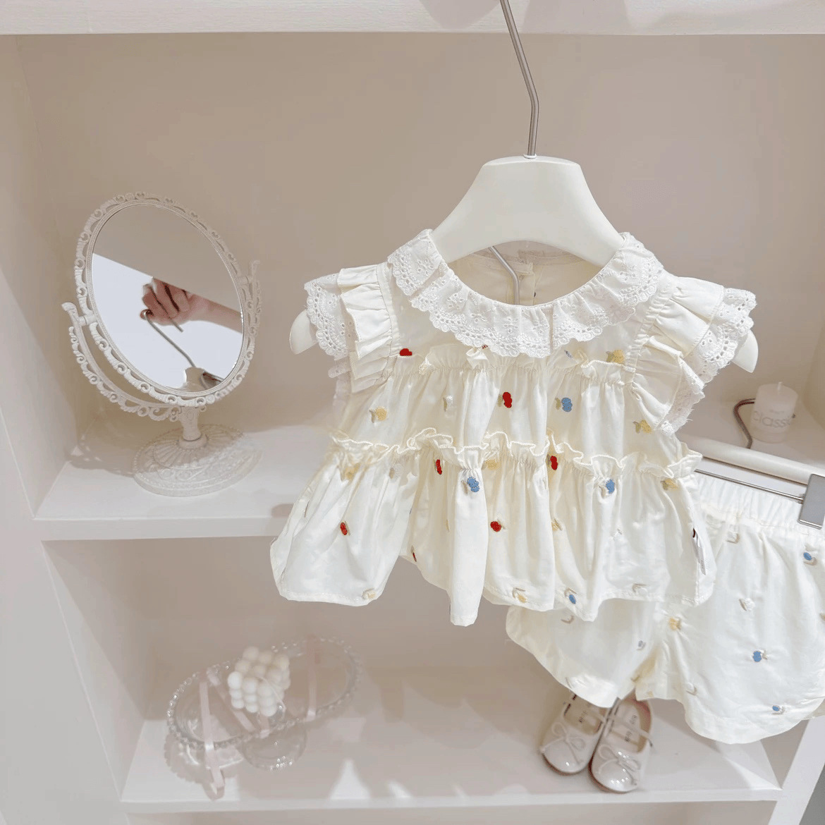 女の子の夏のスーツ2025の新型の洋気の子供のかわいい漫画のプリントの半袖のtシャツの格子のつぼみのスカート