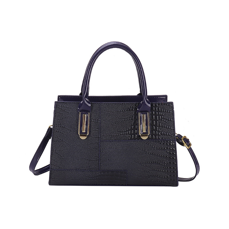 2023 nuevo bolso de platino con patrón de cocodrilo retro, bolso de costura de moda femenina, bolso de mensajero de hombro de viajero de todo fósforo