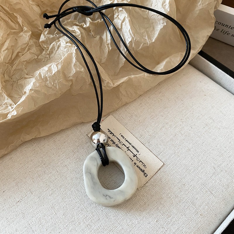 Maillard Collar retro para mujer estilo coreano nuevo suéter de nicho cadena moda otoño e invierno todo fósforo artículos de alta gama al por mayor