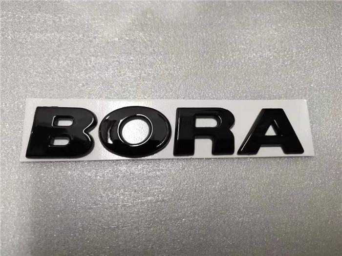 Black FAW-Volkswagen Jetta, Golf, Sagitar, Magotan, and Bora car emblems, Jetta rear lettering