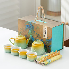 A high-end Kung Fu tea set featuring the exquisite Qianli Jiangshan ceramic design—perfect as a cultural and creative gift embodying traditional Chinese style, ideal for business events or as a thoughtful souvenir for the Dragon Boat Festival.