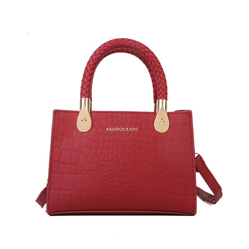 Bolsa de moda con textura para mujer 2024 estilo coreano estilo occidental nuevo color caramelo patrón de piedra bolso tejido bolsa de mensajero