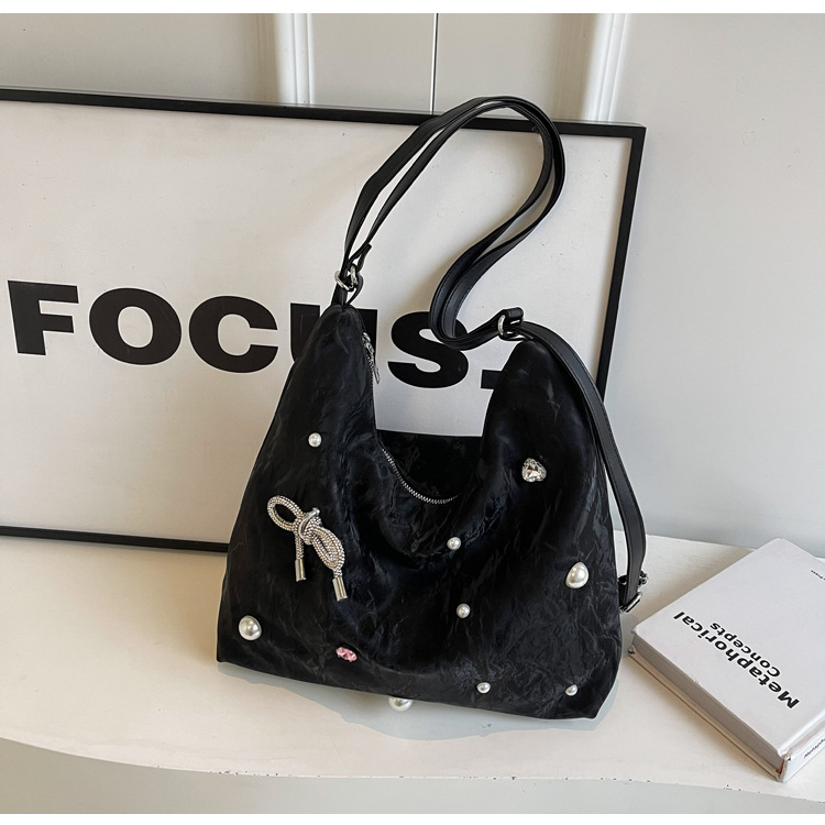 Bolsa de gran capacidad para mujeres 2024 nuevo nicho de alto nivel de diseño de diamantes de viaje multifuncional mochila de doble hombro inclinada