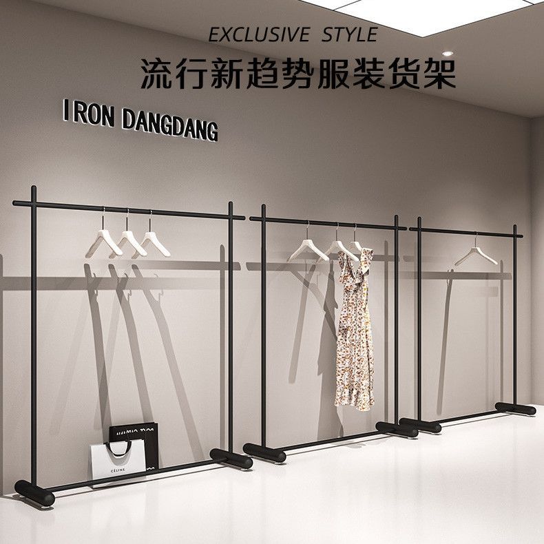 Tienda de ropa negro negro negro de hierro forjado estante de exhibición red centro comercial estante de exhibición de ropa de mujer estante de isla colgando tipo colgante de suelo