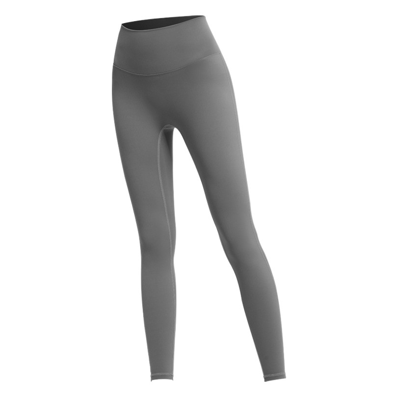Nuevos pantalones de yoga de cintura alta de melocotón europeo y americano pantalones de barbie de deportes ajustados de las mujeres pantalones de fitness de secado rápido