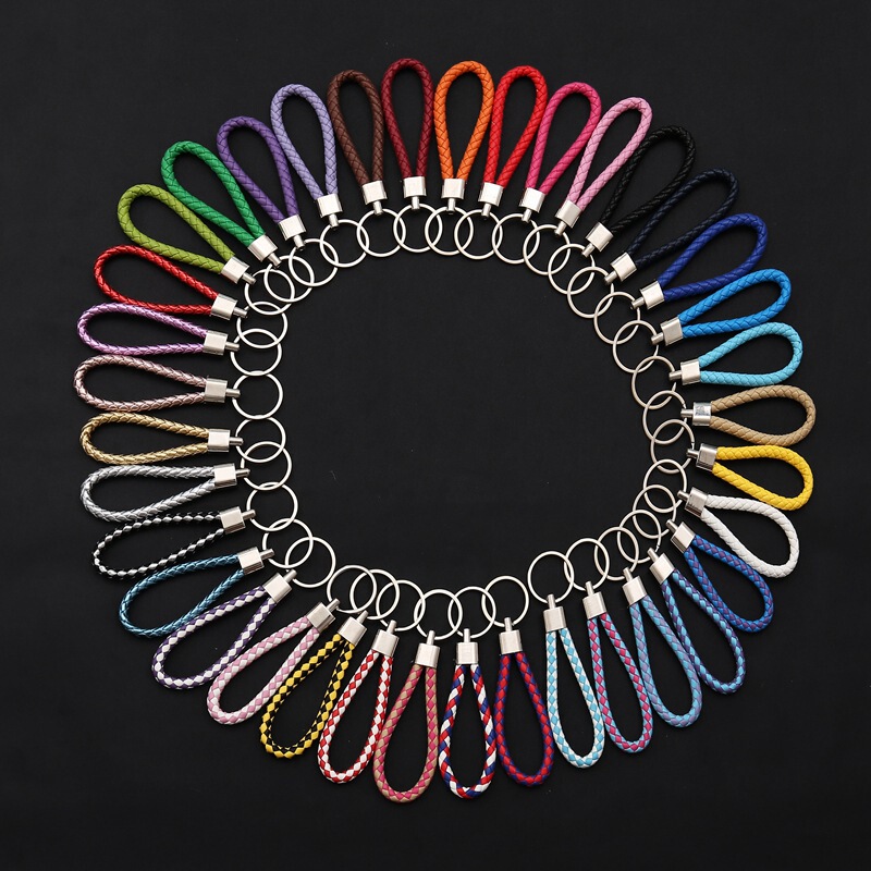 Leather rope key chain car pendant accessories pu woven leather rope key rope to push small gift manufacturers wholesale Leather rope key chain car pendant accessories pu woven leather rope key rope to push small gift manufacturers wholesale