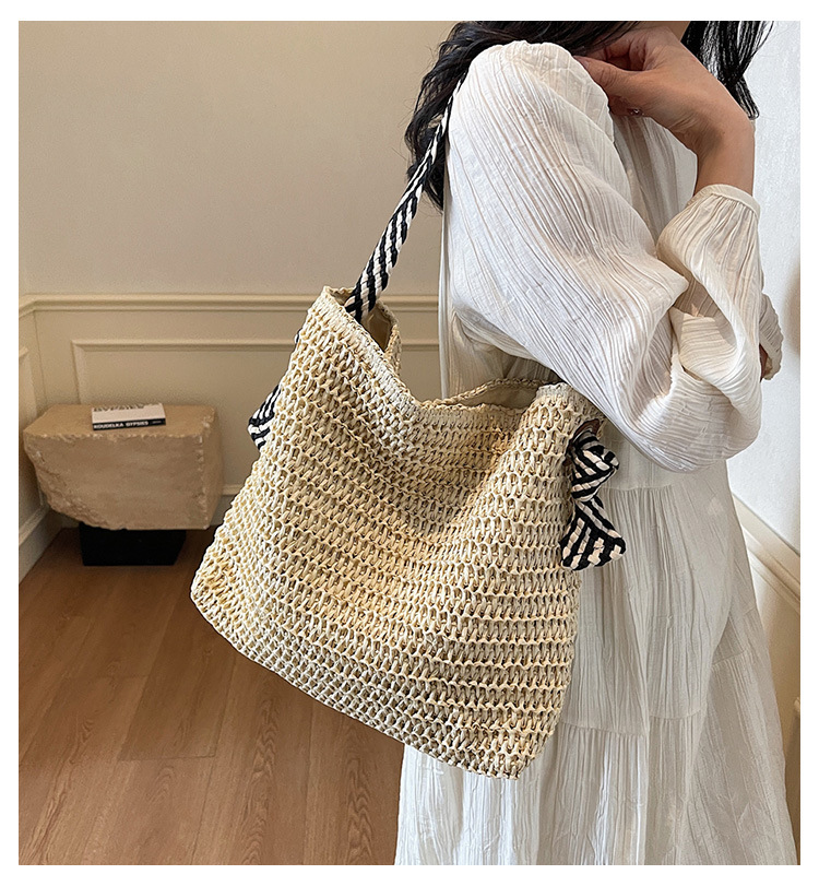 Summer large-capacity straw woven bag for women, 2025 new style seaside and beach vacation single-shoulder bag, commuter tote bucket bag full figure