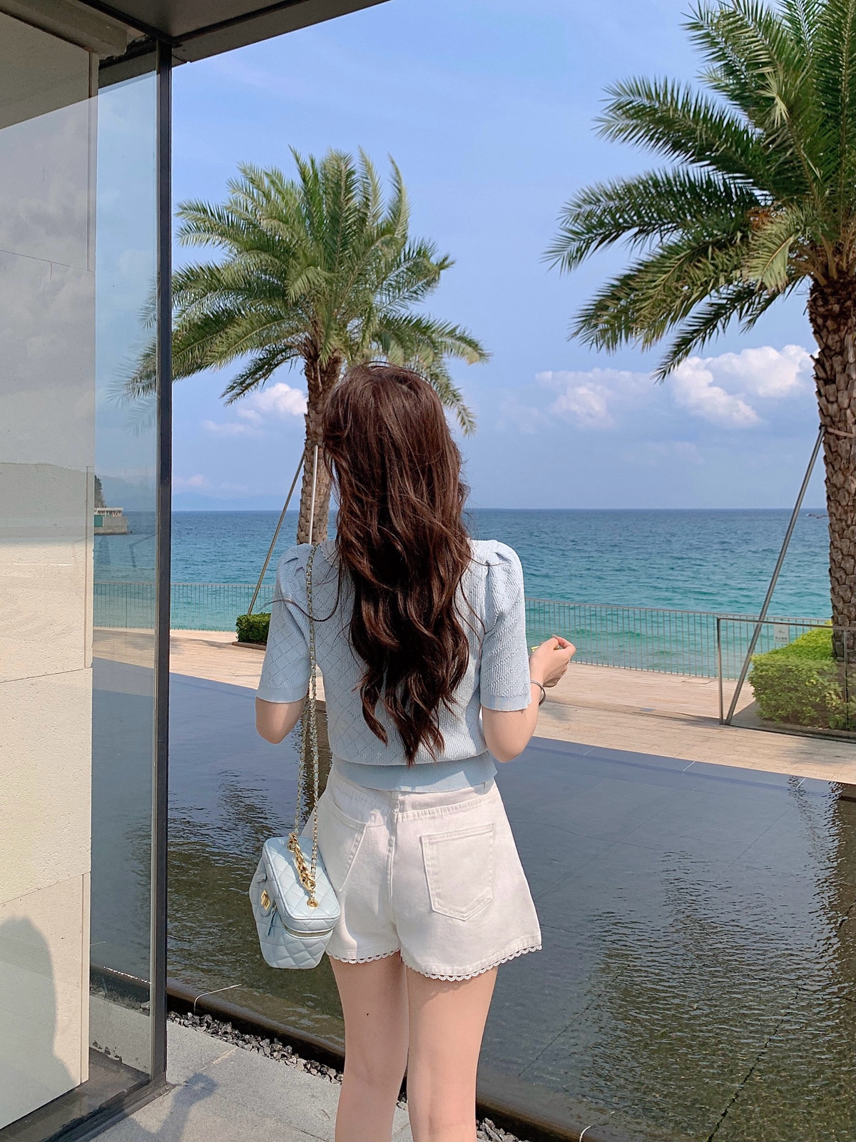 Áo thun nữ cổ lật tay ngắn dệt kim phong cách Pháp — Màu xanh da trời