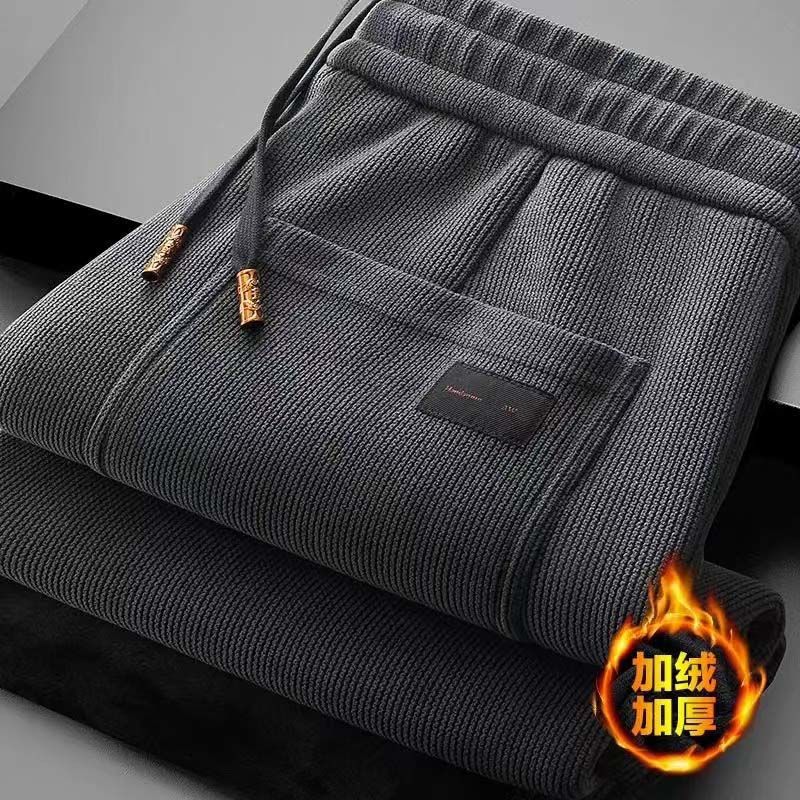 Fuente de fábrica de pantalones de protección de hombre otoño invierno calentamiento pantalones casuales rectos sueltos y pantalones de mediana edad