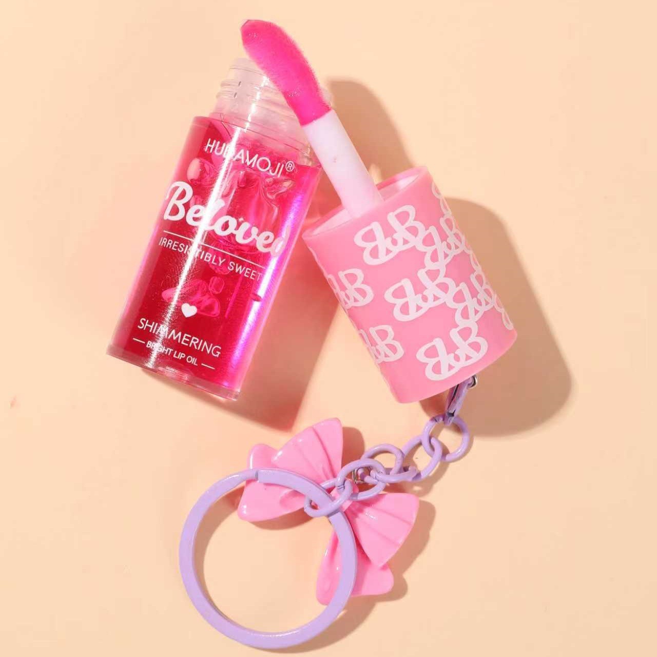 Transfronterizo exclusivo para ondas tropicales llaver de arco de calor decoloración labial aceite hidratante brillante polvo de espejo tierno brillo labial