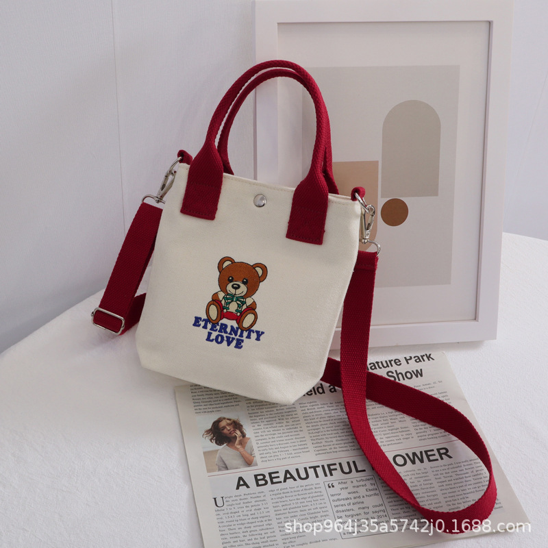 帆布包女学生小众设计ins手拎手机袋时尚休闲斜挎迷你小包包批发