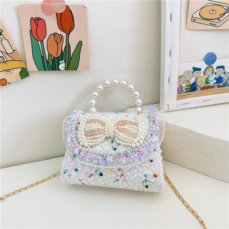 2025 otoño y invierno nuevo arco de perlas de arco de perlas bolsas de niños de tween lindas caricaturas princesa mochila