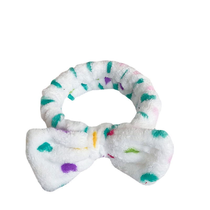 Europa y los Estados Unidos ondulado punto de leopardo coral mariposa fin correa de cabello mujer lavado cara banda de cabello rayas transfronterizas peluche adornamientos para el cabello al por mayor