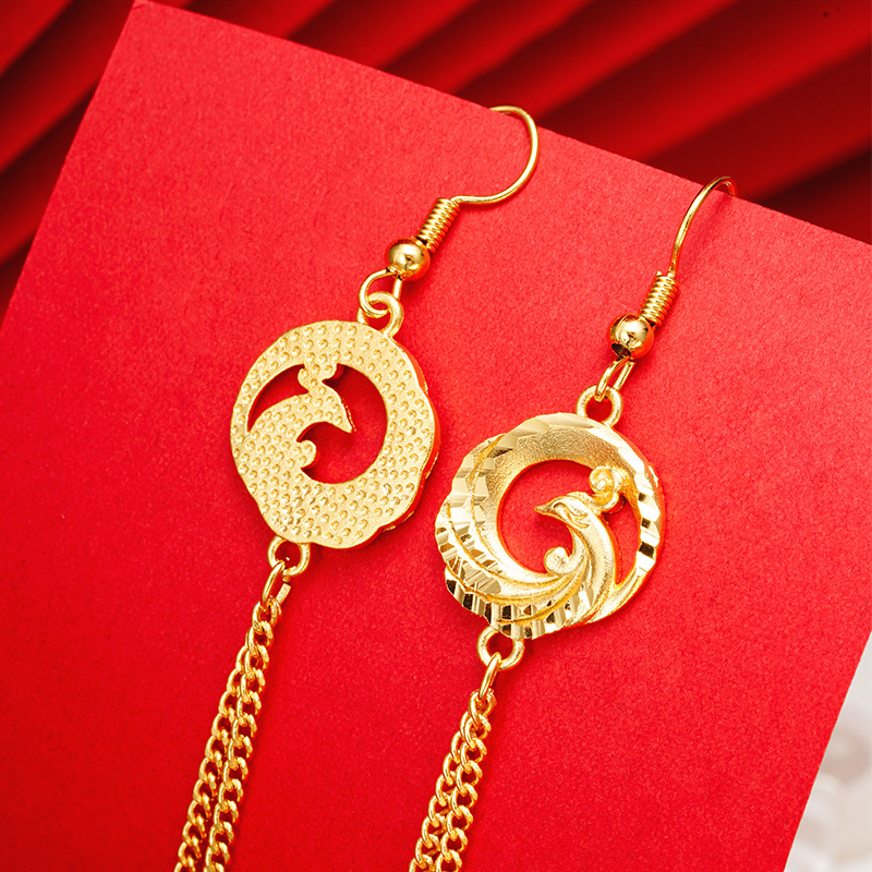 Arena oro gotas para los oídos de las mujeres Phoenix tallado borla pendientes no se desvanece temperamento estilo nacional Phoenix largo retro joyería