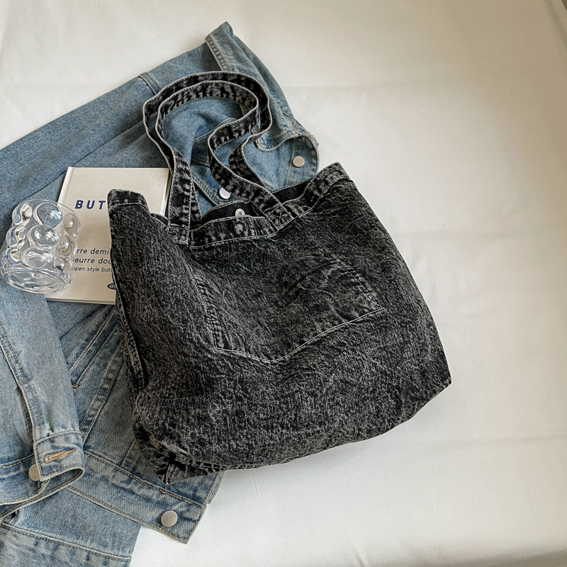 2024 verano nuevo estilo mezclilla bolso de hombro de cercanías simple retro de gran capacidad bolso de mujer al por mayor de moda