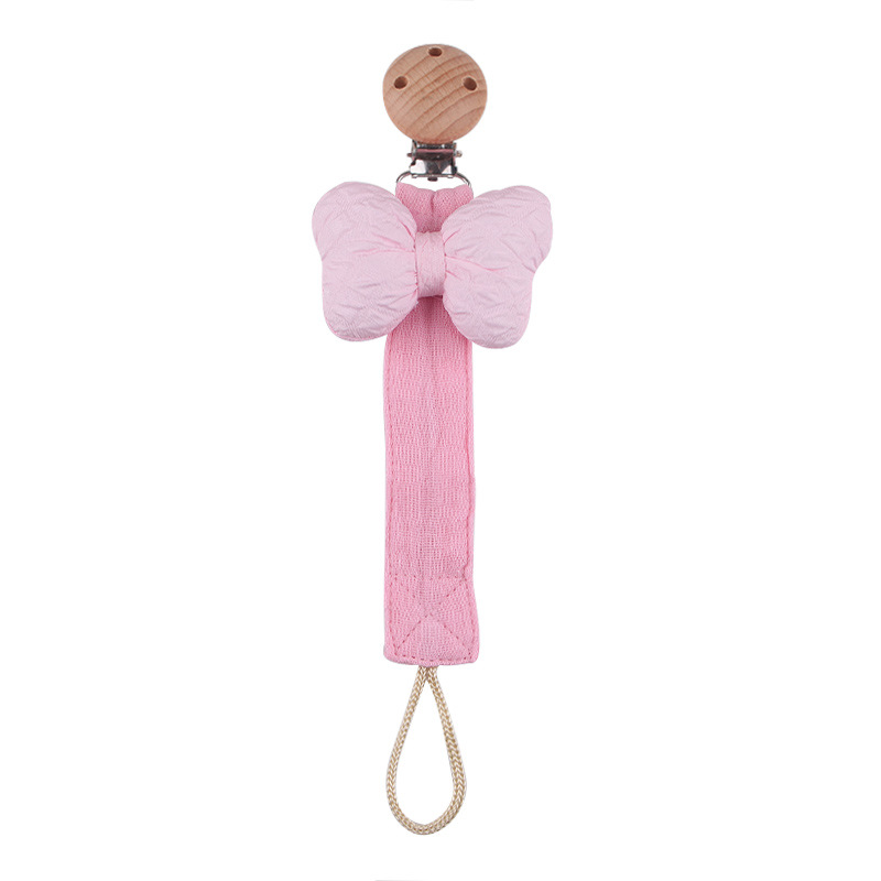 Nuevos productos para bebés clip de chupete de haya arco de dibujos animados cinta de satén de algodón y lino cuerda de chupete cadena de chupete de bebé